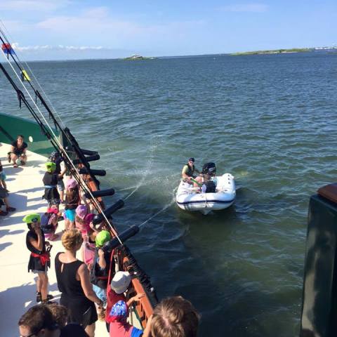 Kids shoot pirate pete with water cannons